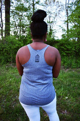Female model wearing a grey racerback tank top a small No Egrets Birdcage logo in black on the back between the shoulders.