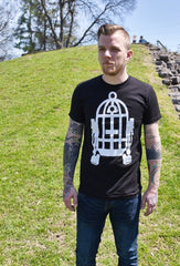Male model wearing a black t-shirt with Fred Palmer's Robot Birdcage design in white on the front.